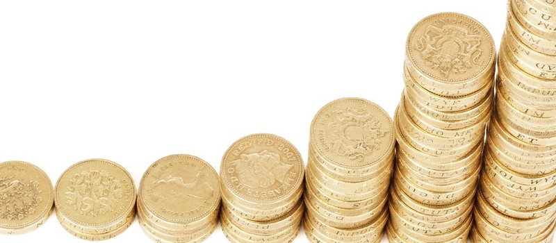 Piles de pièces de monnaie de hauteurs croissantes